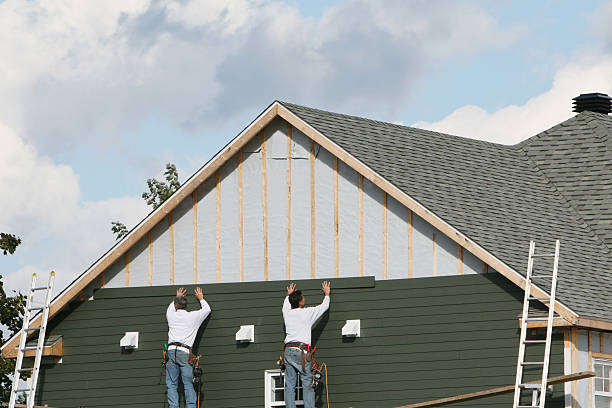 Professional Siding technician working in Franktown, VA
